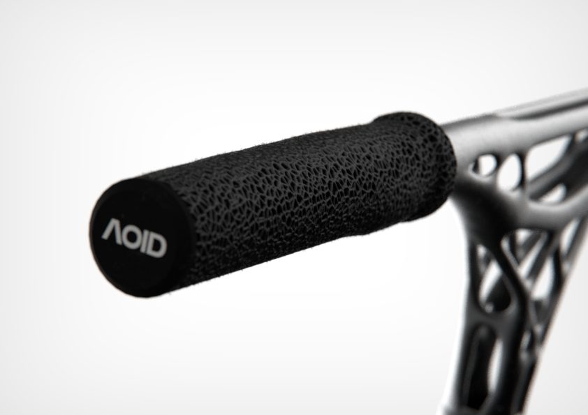 Handlebar and grip, printed as one optimized piece
